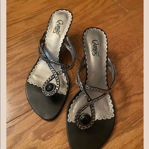 In search of these Carlos Santana sandals in size 7. Had them once, lost one!